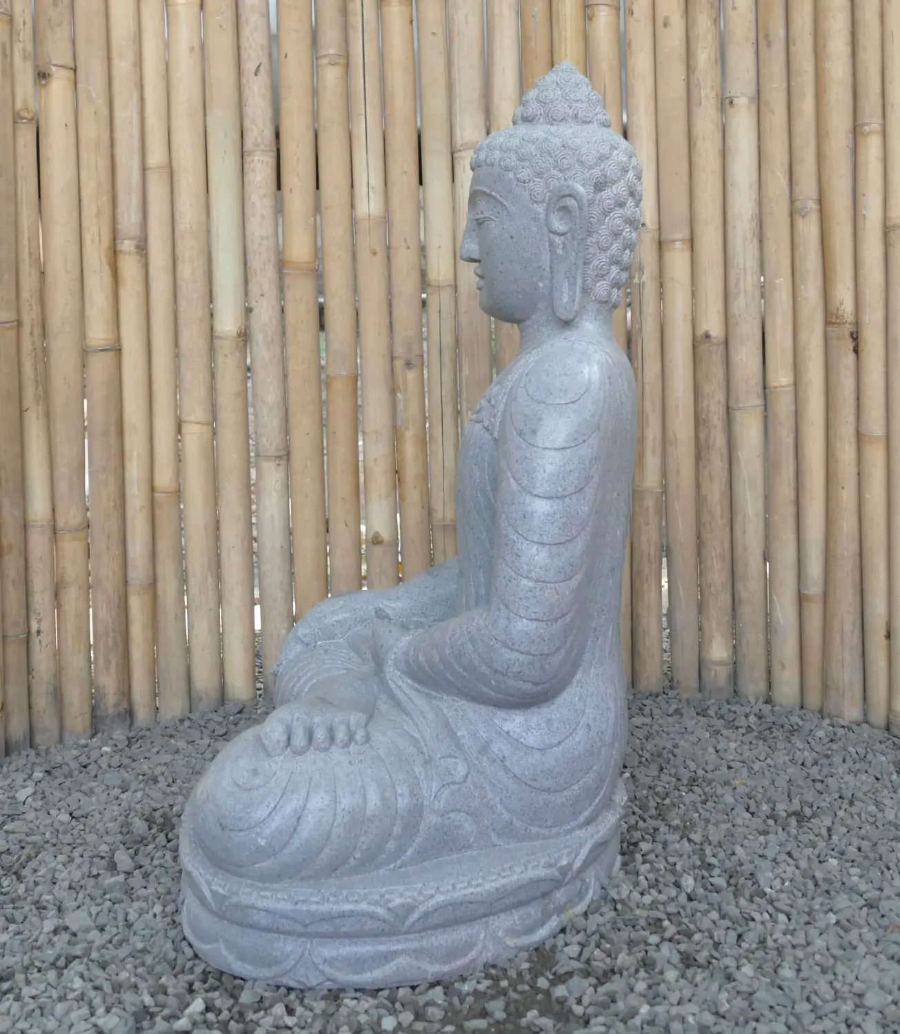  Product image 4 of the product “Seated Buddha made of Riverstone in Bhumisparsha - gesture of touching the earth. 86cm height. ”